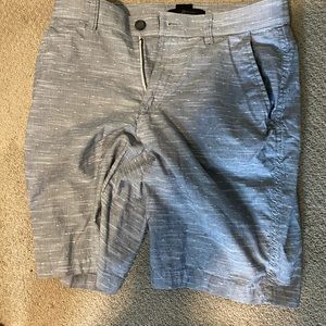 Marc Anthony grey striped above knee slim shorts.